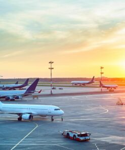 Fototapeta Letiště a zapadající slunce