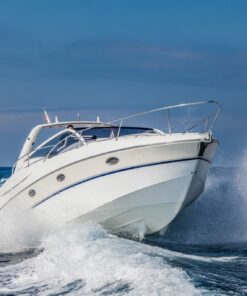 Fototapeta Motorový člun na vlnách