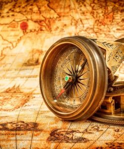 Fototapeta Zlatý kompas na mapě