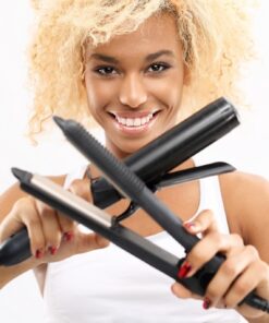 Fototapeta Žena s žehličkou a kulmou